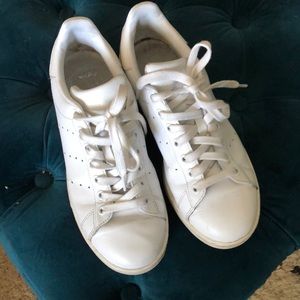 All white Adidas Stan Smith sneakers